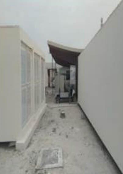 Precast modular building exterior with louvred panels