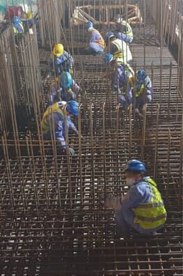Crew fixing a rebar mat