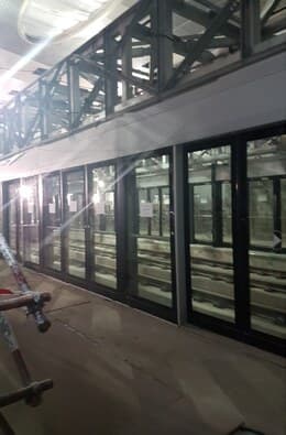 Station glazing installation